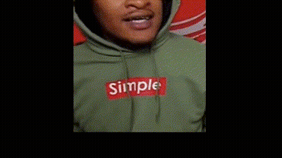 Person In Green Hoodie With Red Box Logo GIF