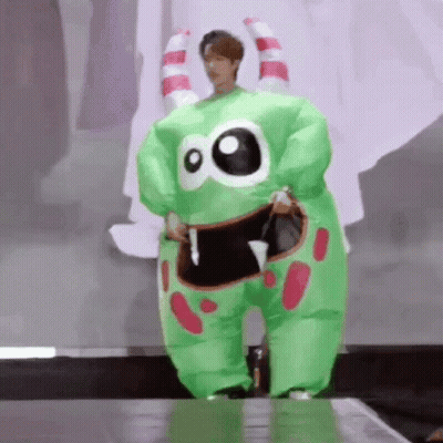 Person In Green Inflatable Monster Costume GIF
