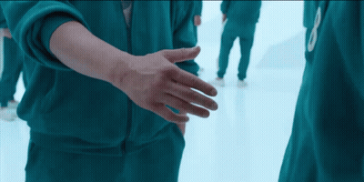 Person In Green Jacket Number 8 GIF