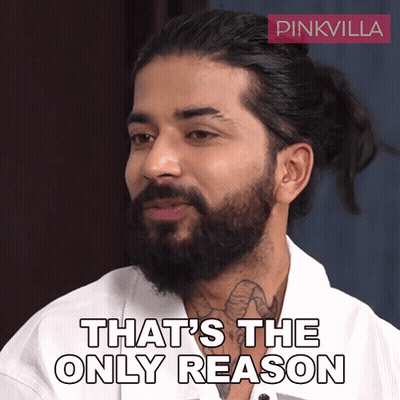 Person In Green Jacket On Blue Mat GIF