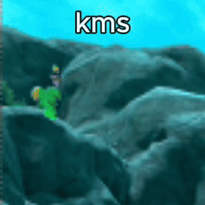 Person In Green Shirt Standing On Rock GIF