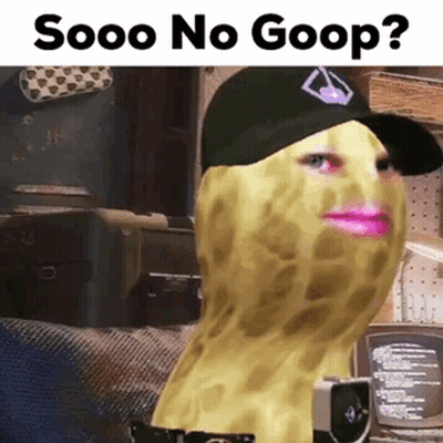 Person In Hat With Peanut On Face Holding Camera GIF