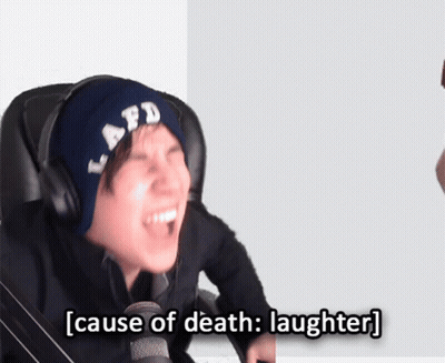 Person In Headphones And Hat Laughing GIF