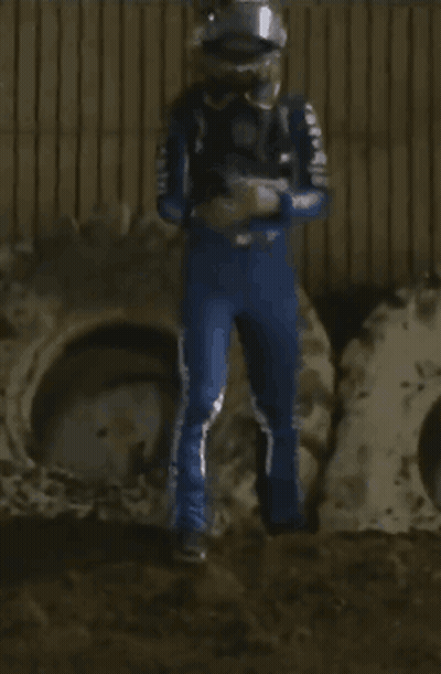 Person In Helmet And Blue Jumpsuit GIF