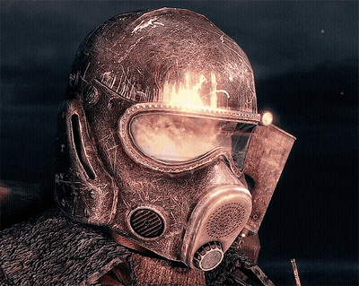 Person In Helmet And Gas Mask With Fire GIF