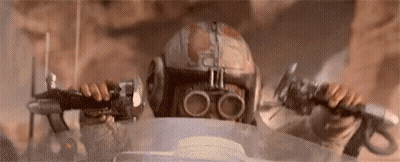 Person in Helmet and Goggles Holding Gun