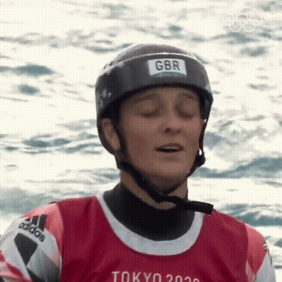 Person In Helmet And Tokyo 2020 Shirt GIF