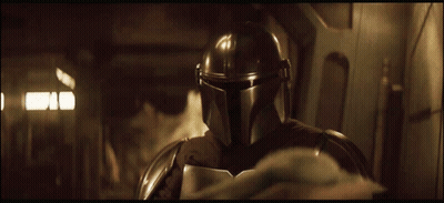 Person In Helmet Standing In Dark Room GIF