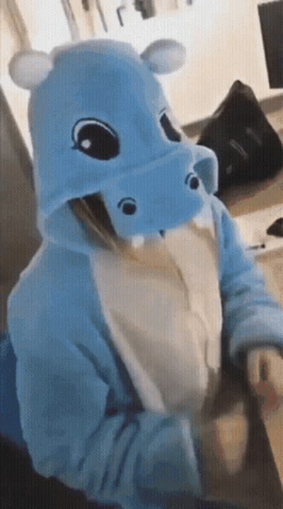 Person In Hippo Costume Sitting At Desk GIF