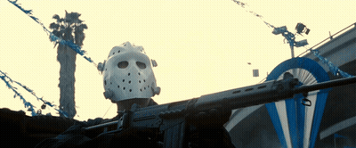 Person In Hockey Mask Holding Gun GIF