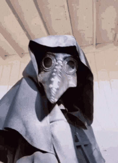 Person In Hooded Cape And Mask GIF