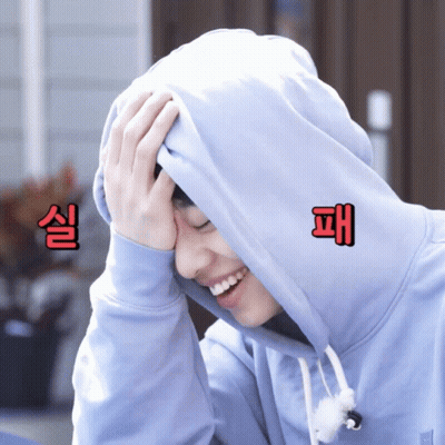 Person In Hooded Sweatshirt With Chinese Characters GIF