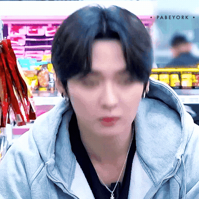 Person In Hoodie With Necklace GIF