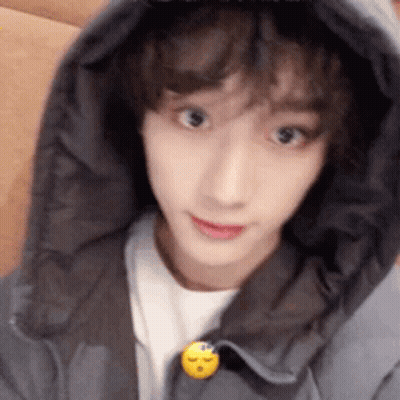 Person In Hoodie With Smiley Face GIF