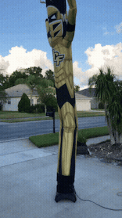 Person In Knight Costume With Letter U GIF