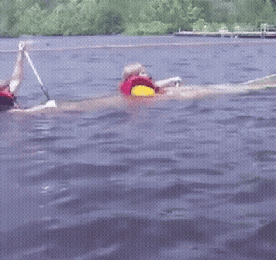 Person In Life Jacket Swimming GIF