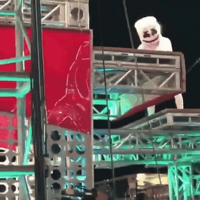 Person In Marshmallow Costume On Stage At Night GIF