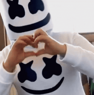 Person In Marshmello Costume Making Heart Shape GIF
