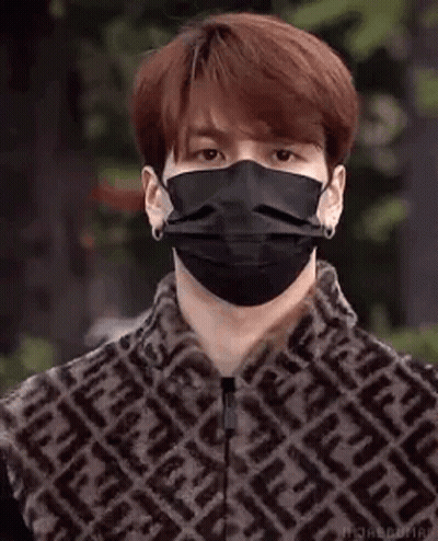 Person In Mask And Fur Jacket GIF