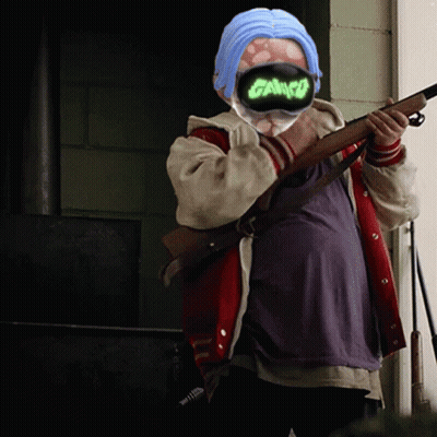 Person In Mask Saying Cargo Holding Gun GIF