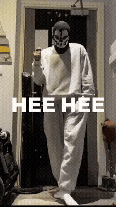 Person In Mask Standing In Front Of Door Saying Hee Hee GIF