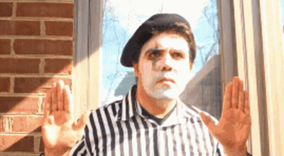 Person In Mime Mask Covering Eyes GIF