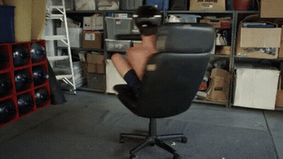 Person In Office Chair With Just Moved Box GIF