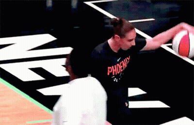Person In Phoenix Shirt Holding Basketball GIF
