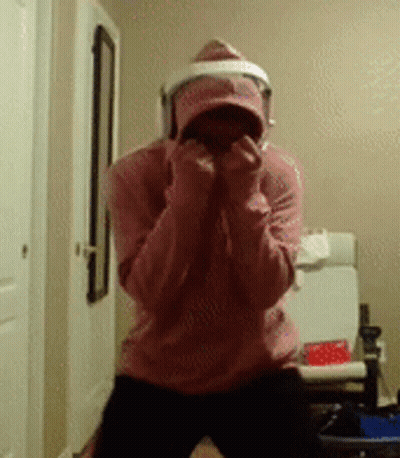 Person In Pink Hoodie And White Hat GIF