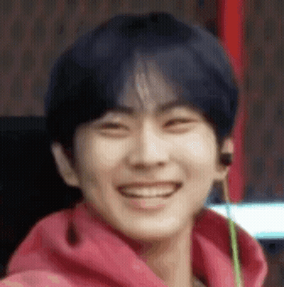Person In Pink Hoodie With Headphones GIF