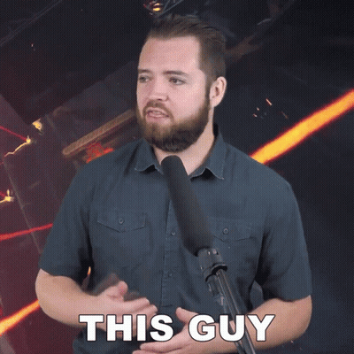 Person In Pink Jacket In Front Of Snow Covered Taxis GIF
