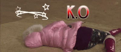 Person In Pink Jacket Laying On Floor With K.O GIF