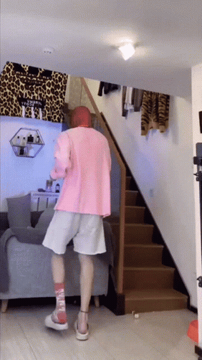 Person In Pink Shirt And White Shorts GIF