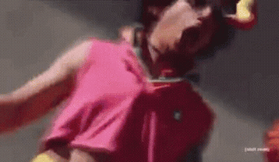 Person In Pink Shirt And Yellow Belt GIF