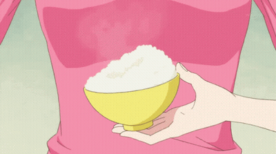 Person In Pink Shirt Holding Yellow Rice Bowl GIF