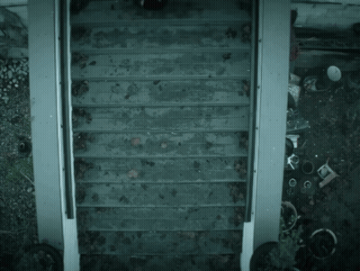 Person In Purple Coat GIF