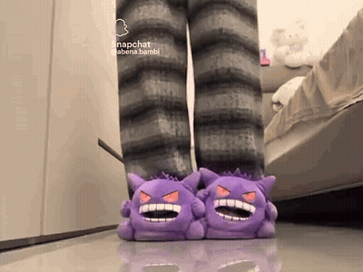 Person In Purple Monster Slippers With Snapchat Icon GIF