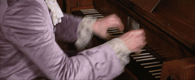 Person In Purple Shirt Playing Keyboard GIF