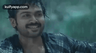 Person In Rain With Sword GIF