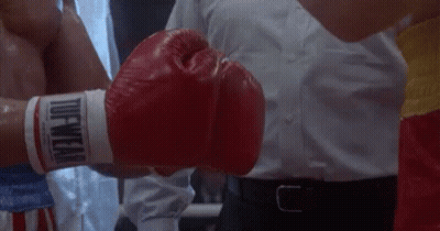 Person In Red Boxing Gloves Saying Dewear GIF