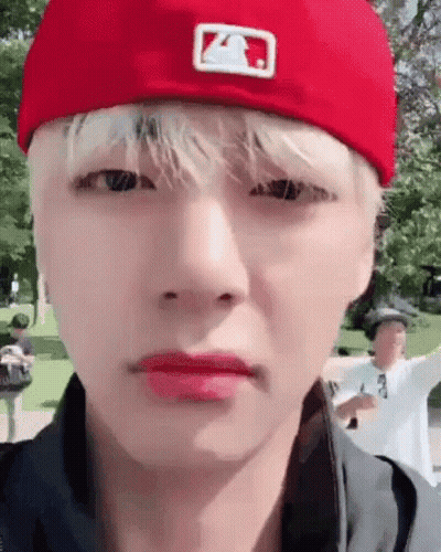 Person In Red Hat Making Face GIF