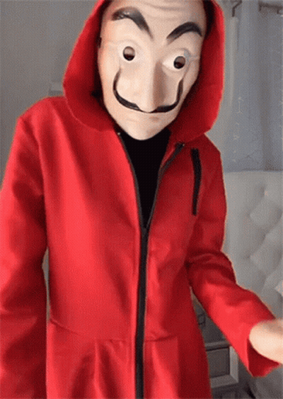 Person in Red Hoodie and Mask