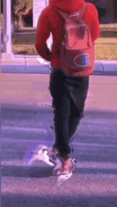 Person In Red Hoodie With Champion Backpack GIF