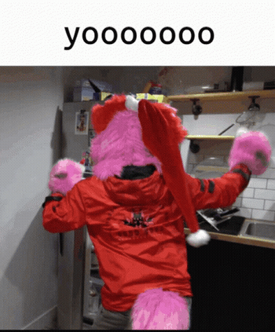 Person In Red Jacket And Santa Hat Saying Yooooooo GIF