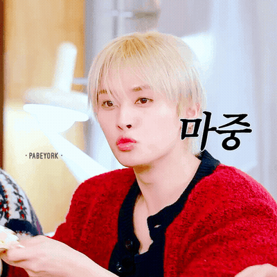 Person In Red Sweater With Korean Writing GIF