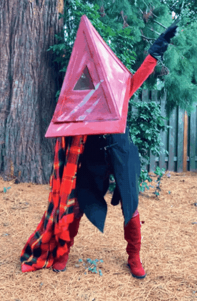 Person In Red Triangle Costume GIF