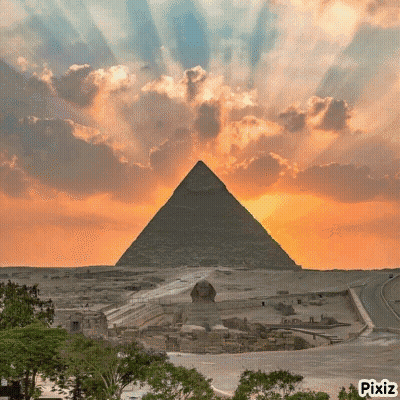 Person In Red Triangle Costume In Field GIF