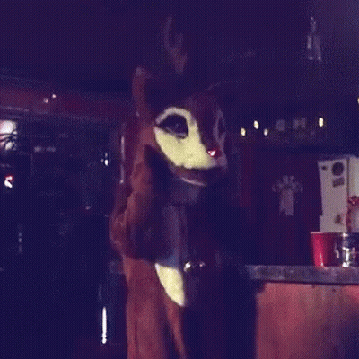 Person In Reindeer Costume With Bell GIF