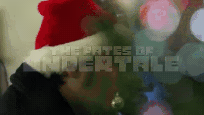 Person In Santa Hat In Front Of Christmas Tree Saying The Paths Of Undertale GIF