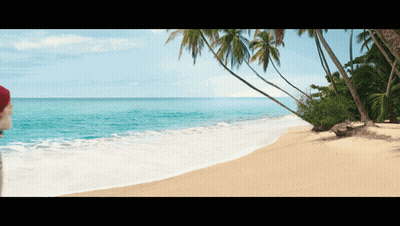 Person In Santa Hat On Beach GIF